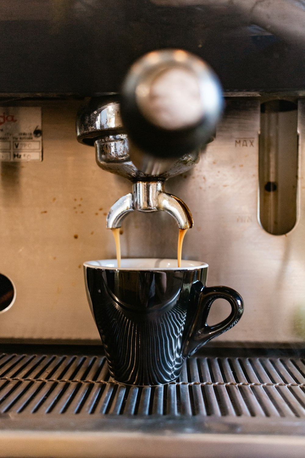 black and silver coffee maker