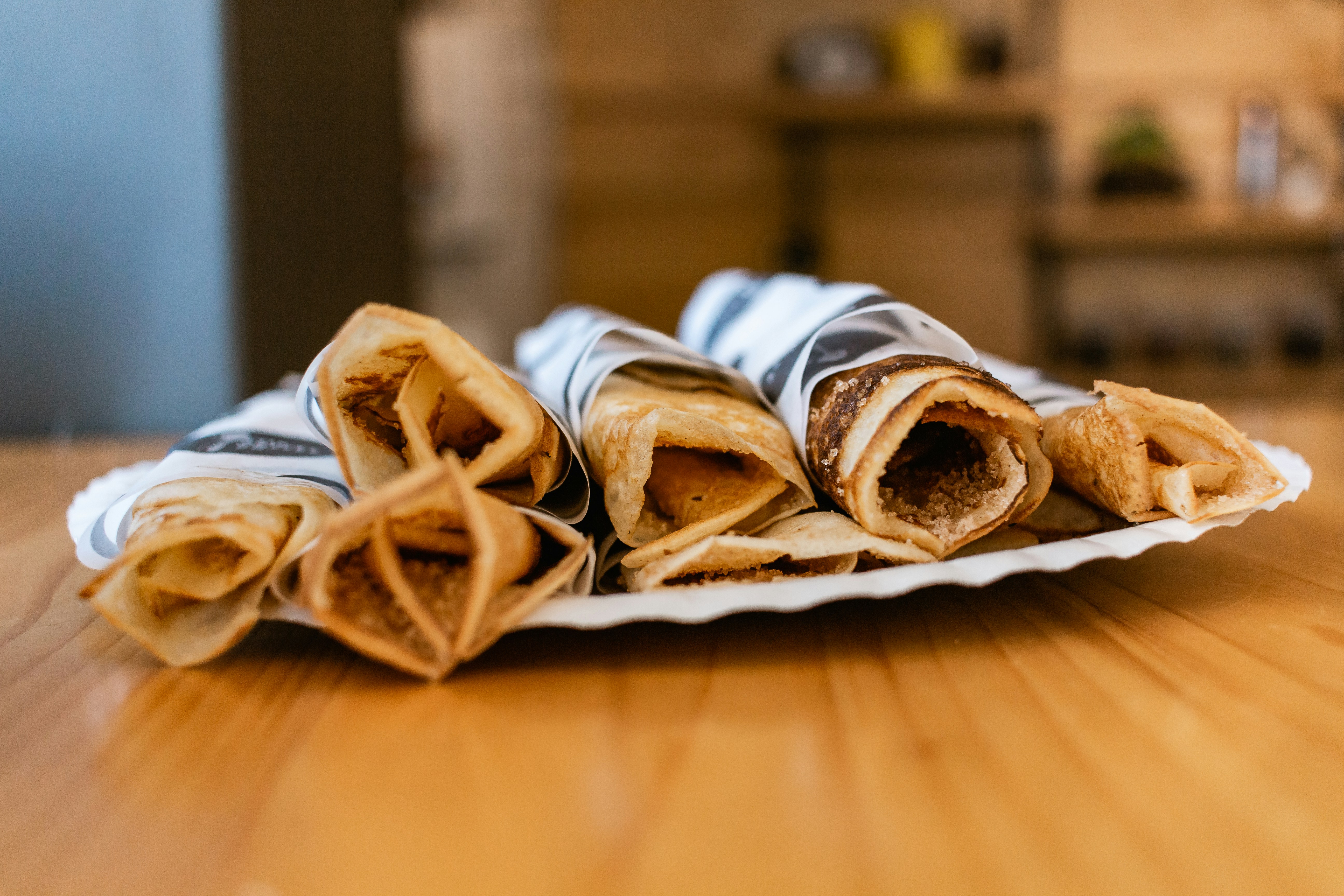 Rolled flatbreads on a wooden board