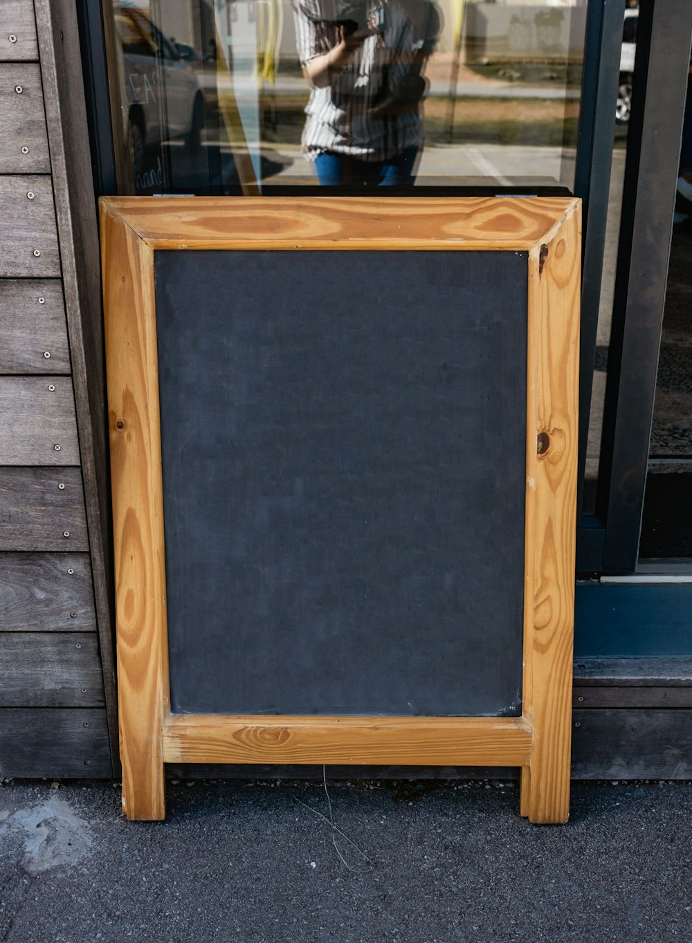 brown wooden framed black board