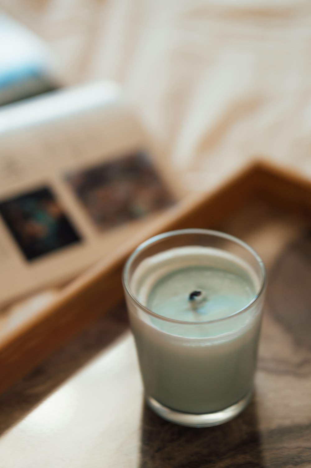 clear drinking glass with white liquid inside