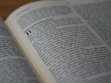 Open hardcover book displaying crisp, clear text and images.