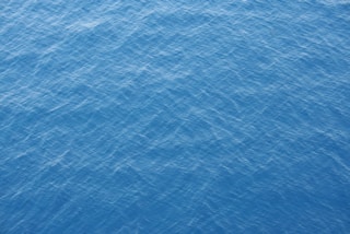 blue and white body of water