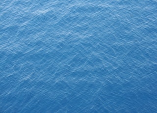 blue and white body of water