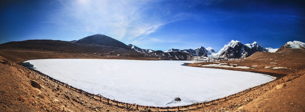 snow covered mountain during daytime