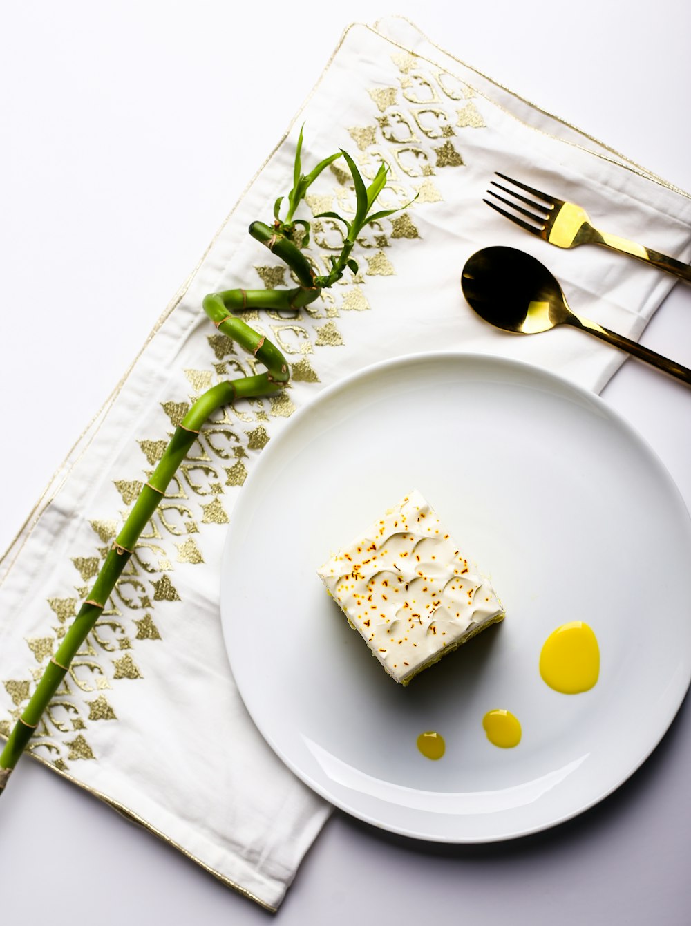 white ceramic plate with green vegetable