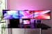black flat screen tv on white wooden table