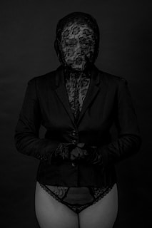 man in black suit jacket