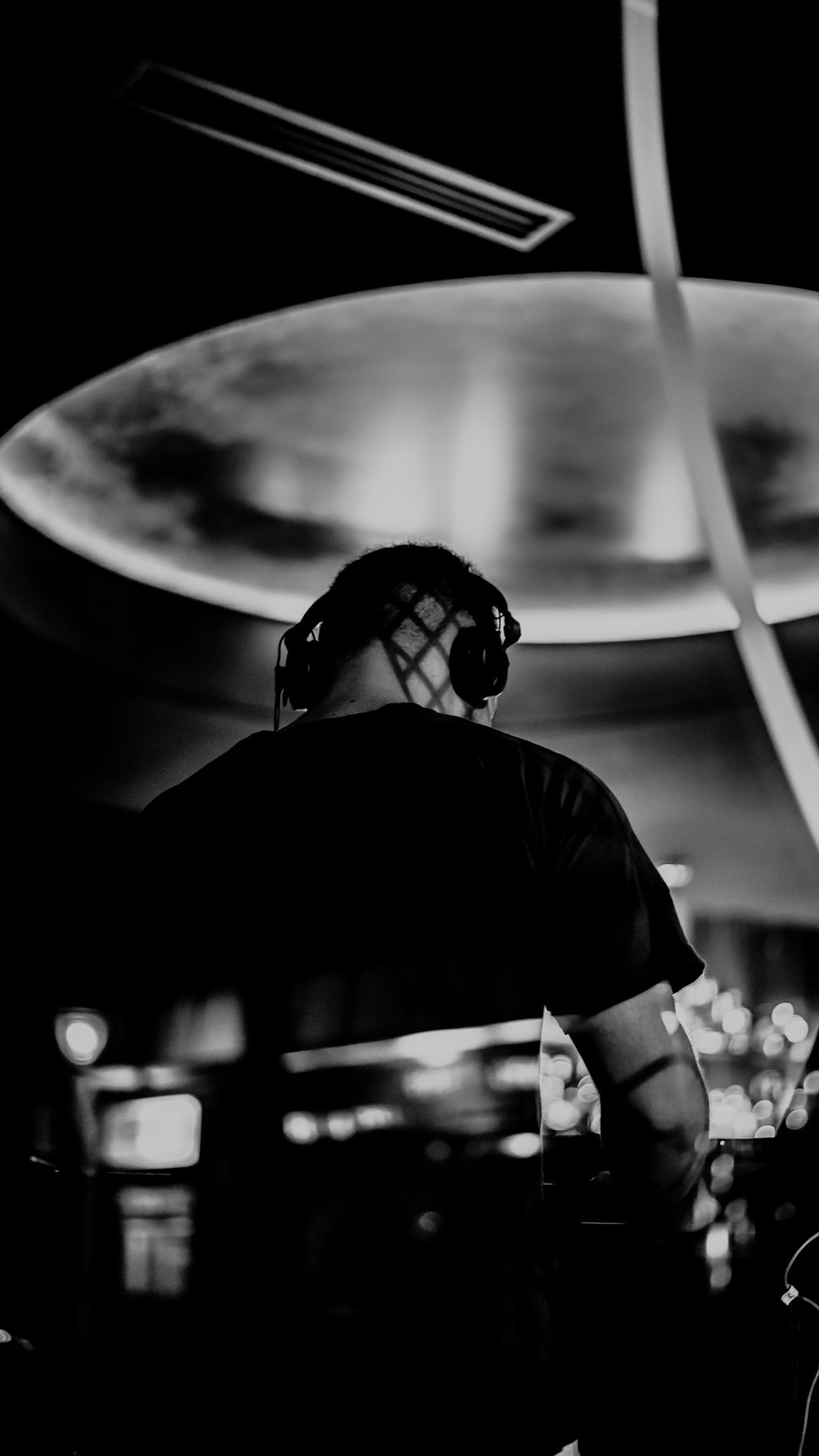 grayscale photo of man in t-shirt