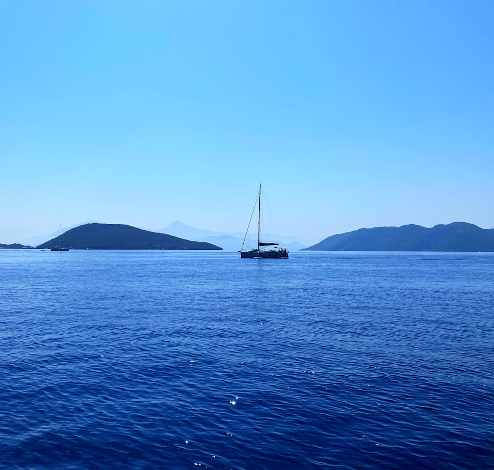 sailboat on sea during daytime