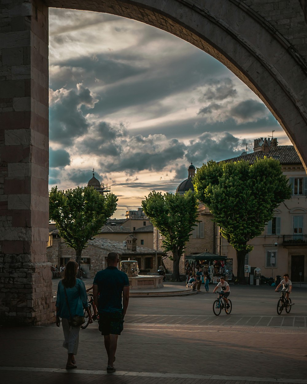 people walking on sidewalk during daytime