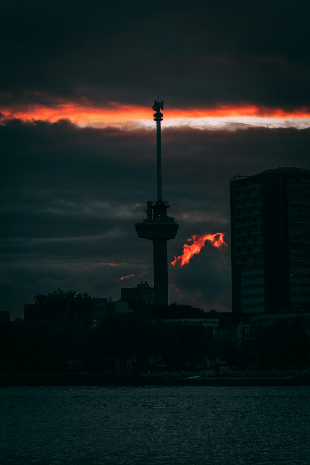 silhouette of tower during sunset