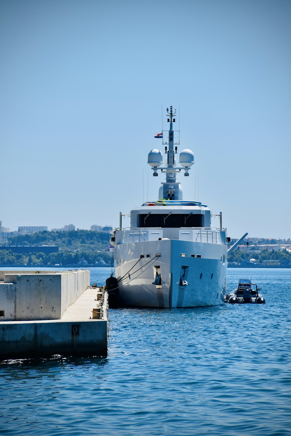 white and black ship on sea during daytime