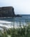 brown rock formation on sea water during daytime