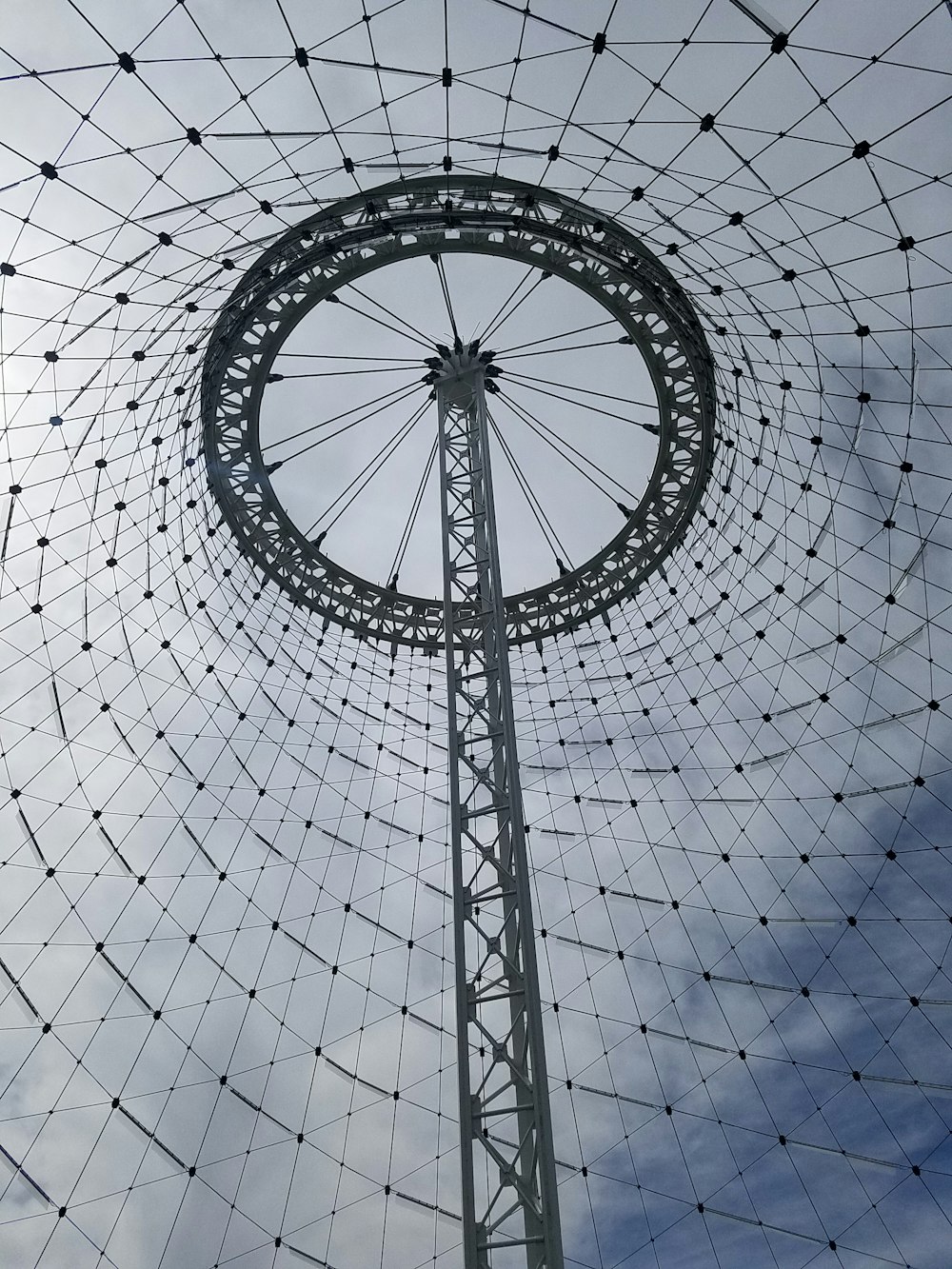 low angle photography of black metal tower