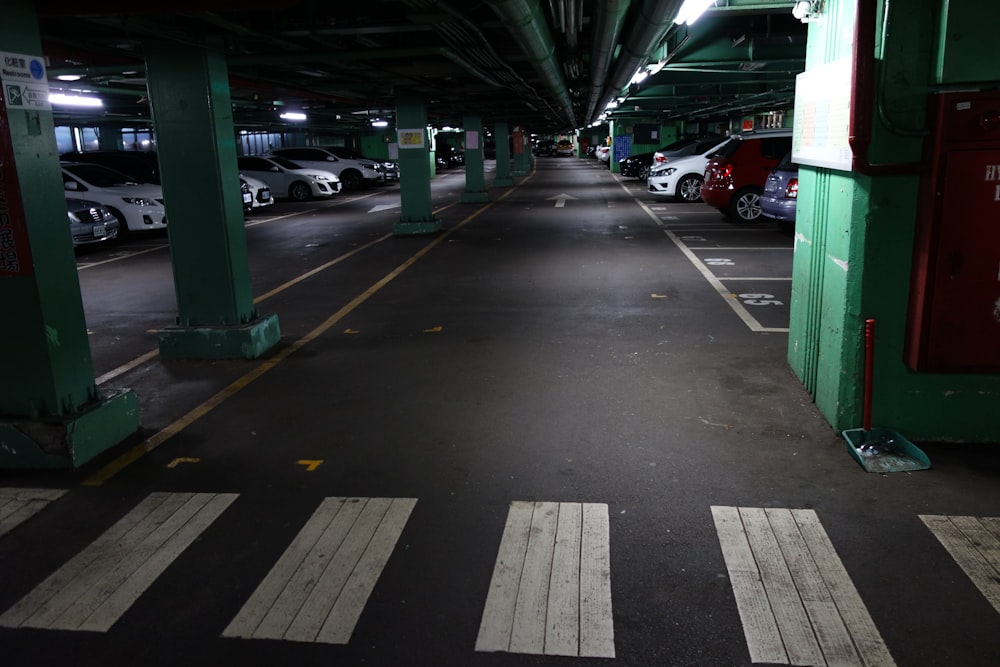 cars parked on parking lot during night time