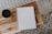 white printer paper on brown wooden table