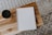 white printer paper on brown wooden table