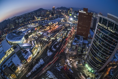 A sleek digital map interface highlighting data points across a global cityscape at dusk.