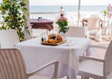 white ceramic plate on white table