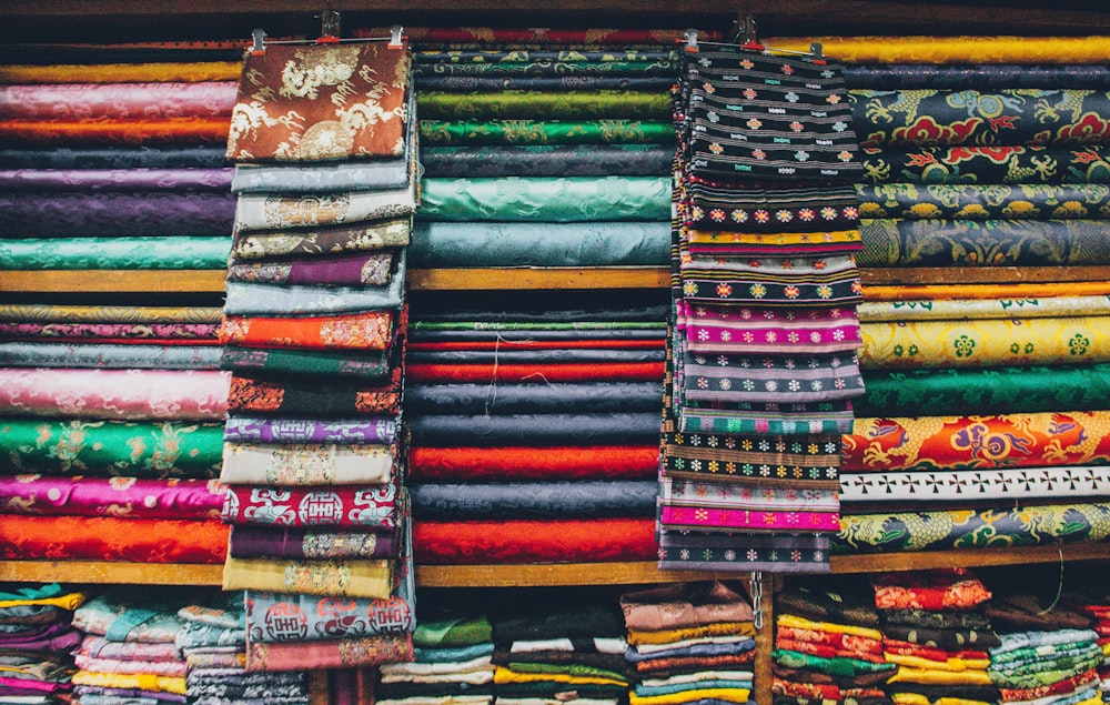 green white and brown floral textile