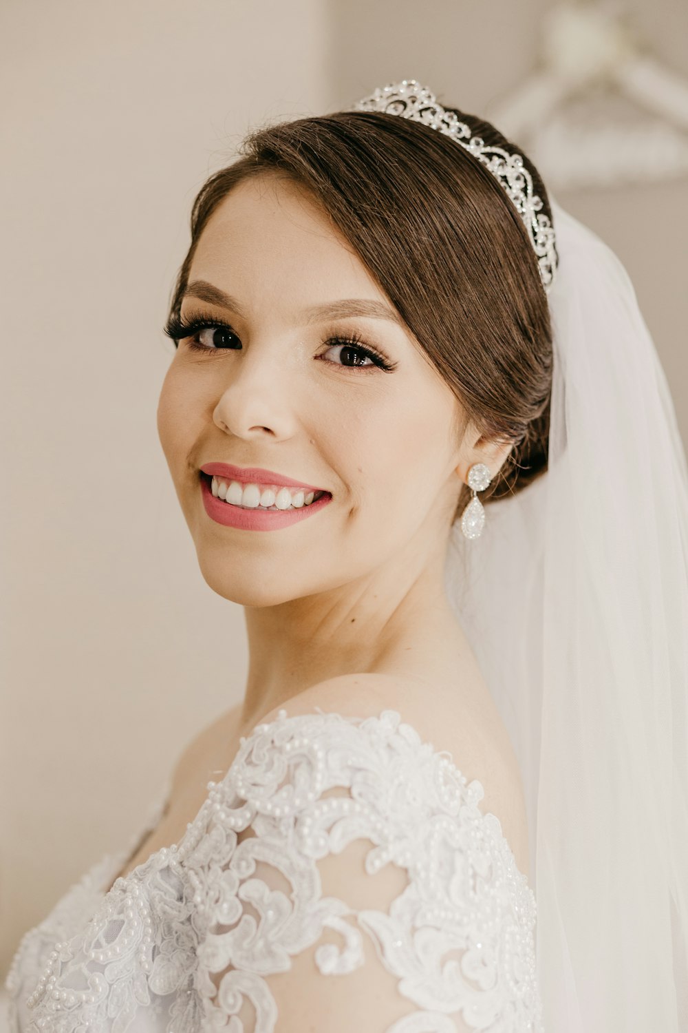 woman in white floral lace dress