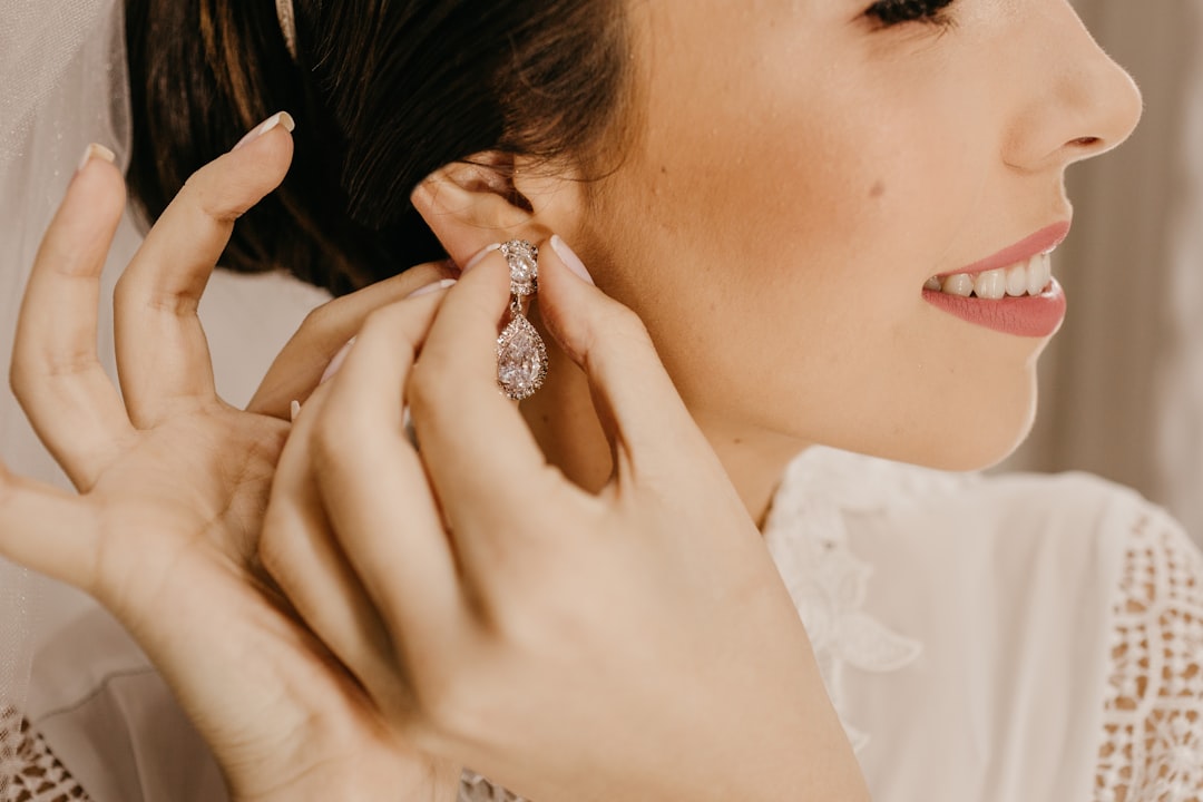 woman wearing silver diamond ring