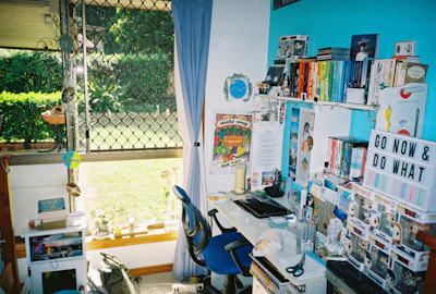 A tidy office corner with navy blue and gold accents, reflecting the rp bookkeeping brand colors.