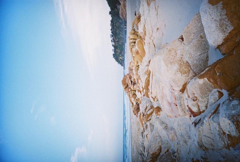 white and brown rock formation under blue sky during daytime