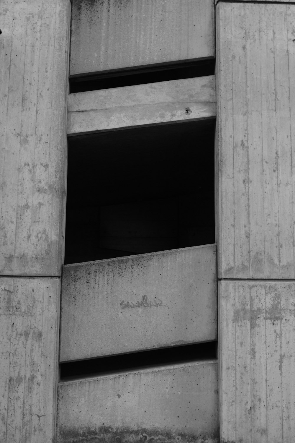 grayscale photo of wooden wall