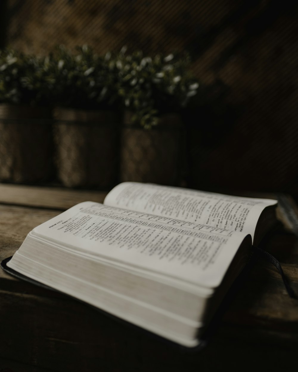 white book page on brown wooden table