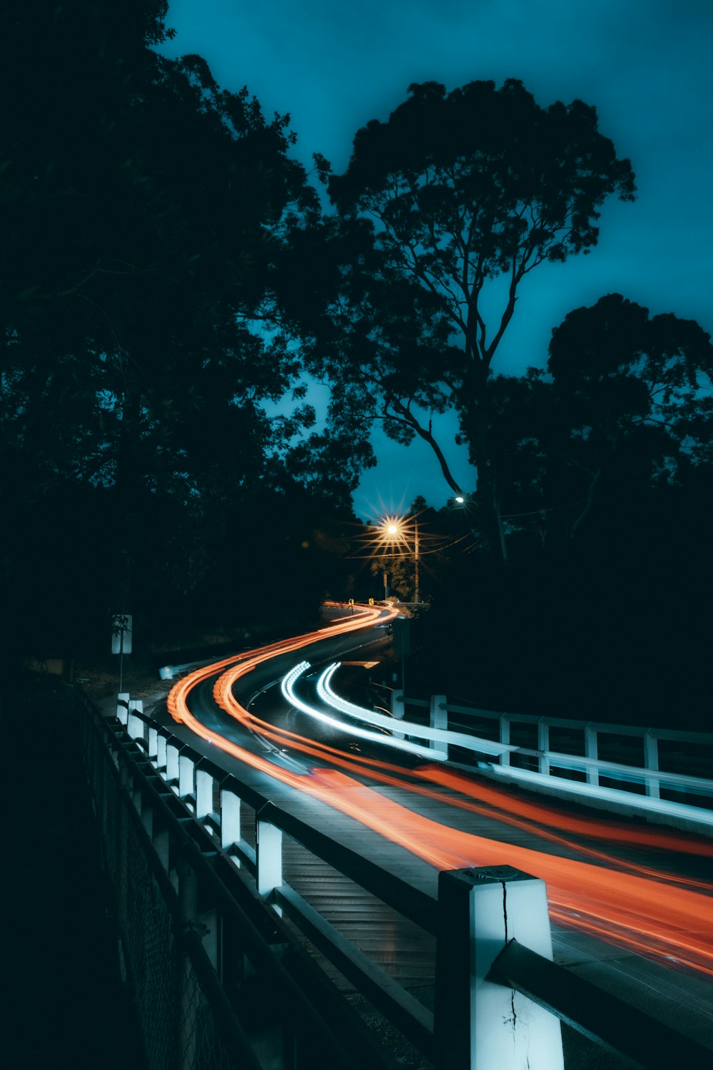 time lapse photography of cars on road during night time