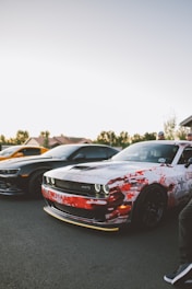 red and black chevrolet camaro
