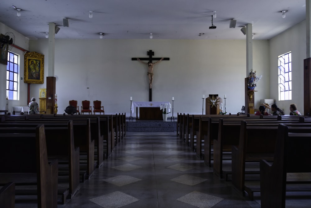 brown wooden chairs inside church