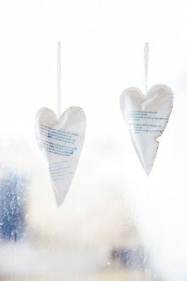 Couple memory bags displayed on a light green background, showcasing heartfelt custom prints.