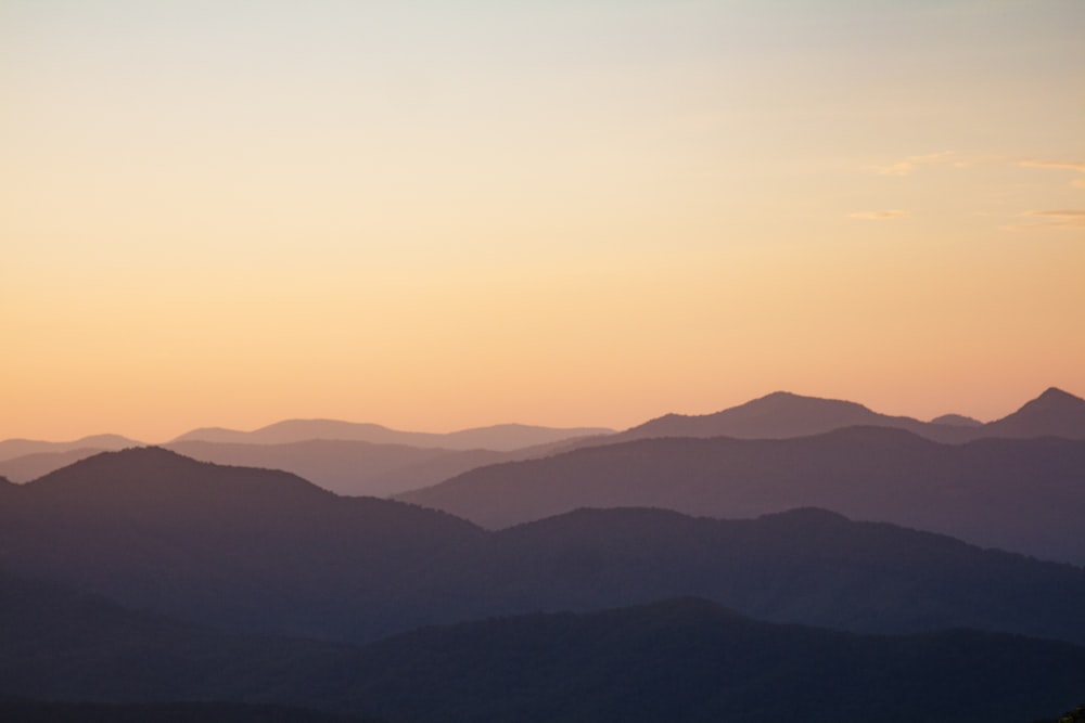 silhouette of mountains during sunset