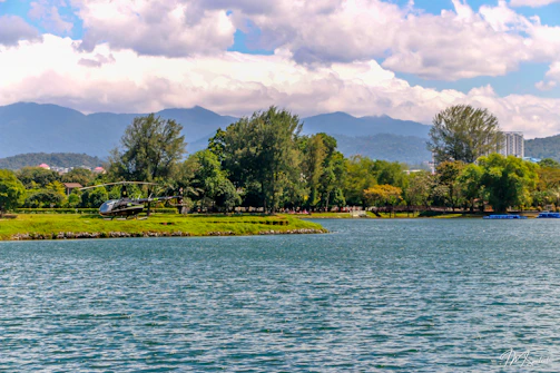 Completed helipad surrounded by natural landscape with clear blue sky.