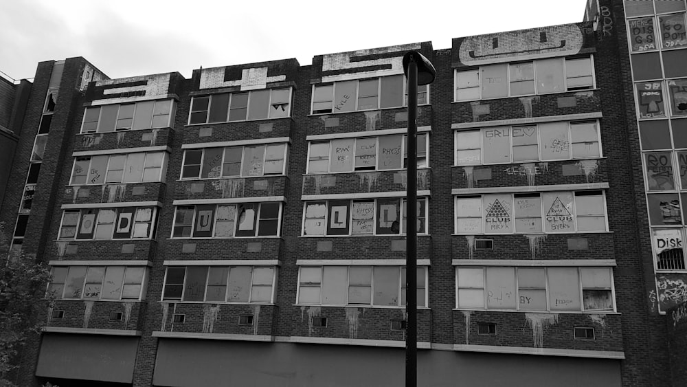 grayscale photo of concrete building