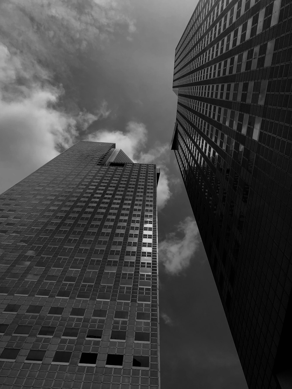 grayscale photo of high rise building