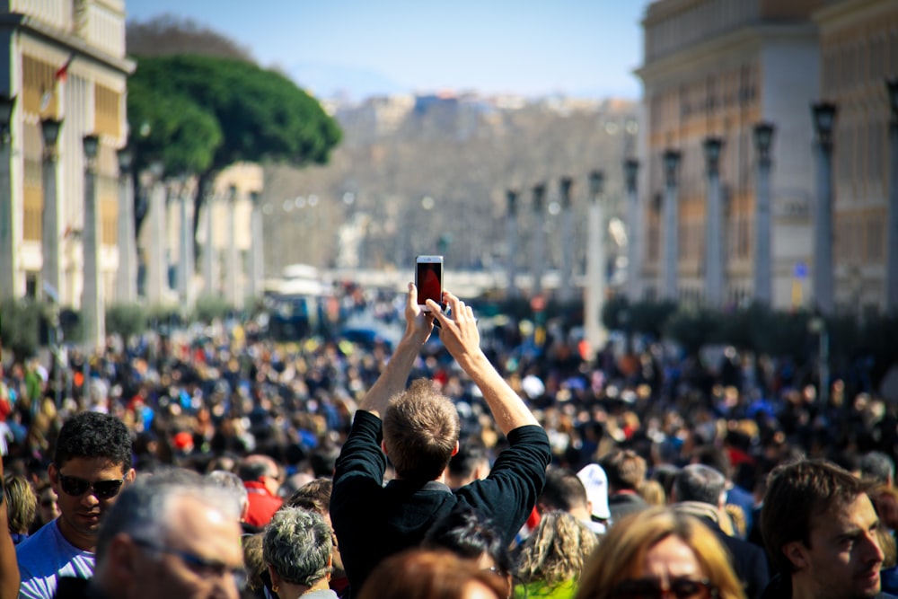 people gathering on a concert during daytime