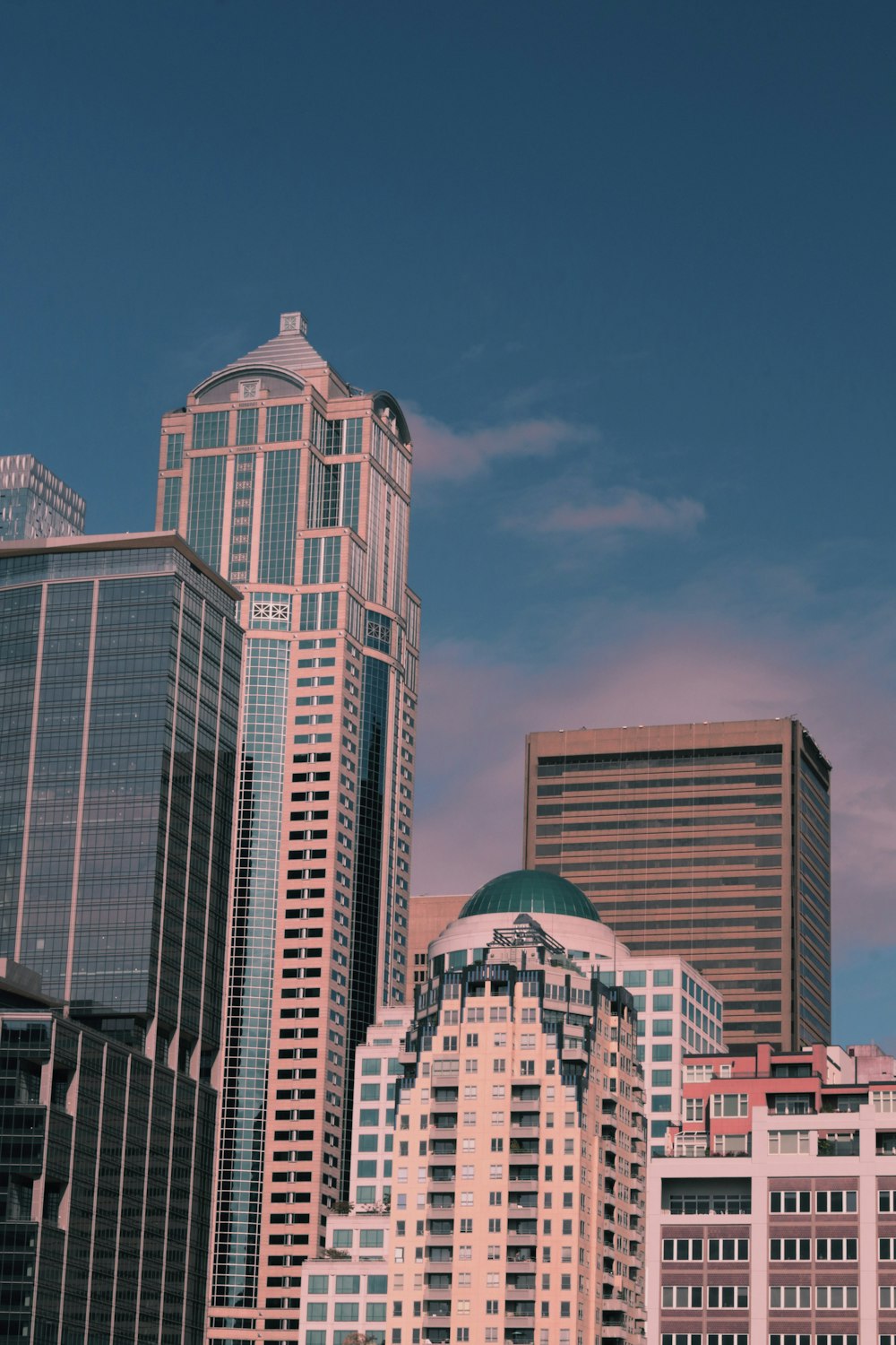 white concrete building under blue sky during daytime