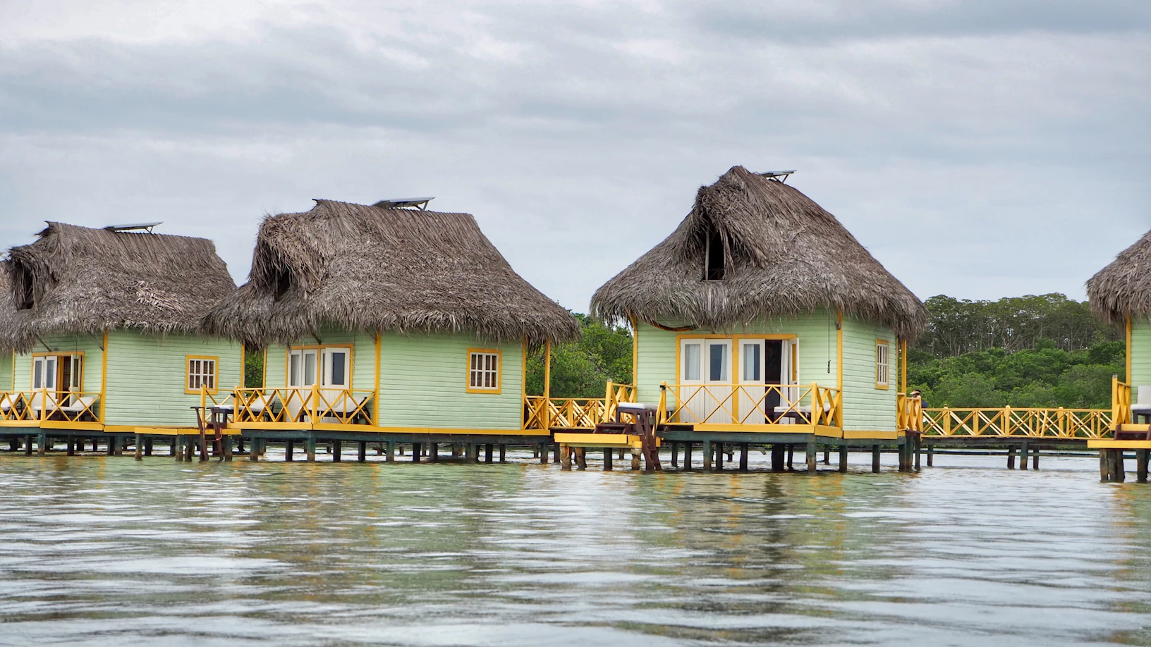 A classic wooden overwater bungalow in the Caribbean