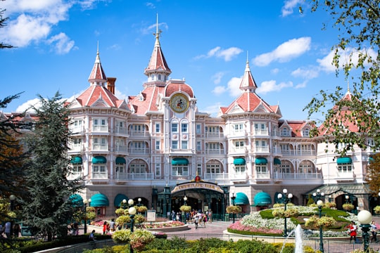 brown and white concrete building in Disneyland Resort Paris, Hotel France