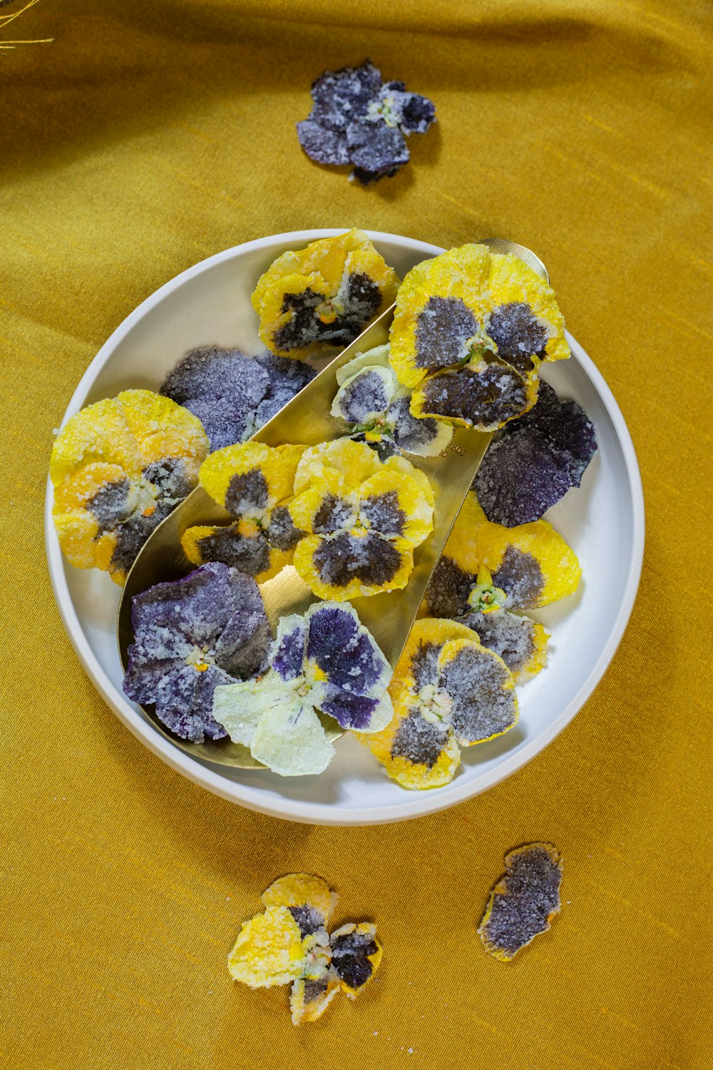 yellow and white flowers on white ceramic bowl