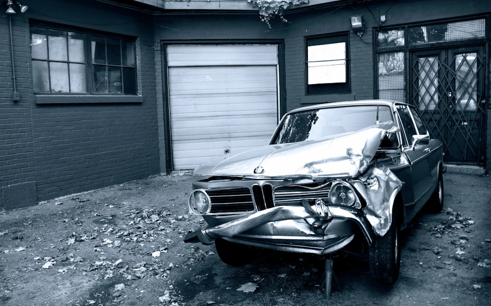 grayscale photo of vintage car