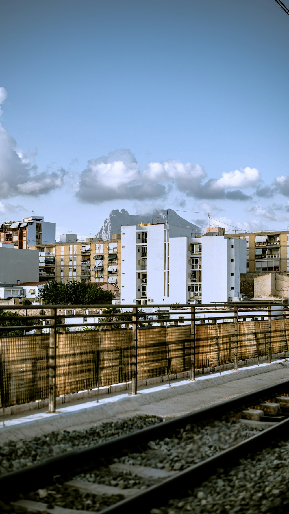 white concrete building under blue sky during daytime