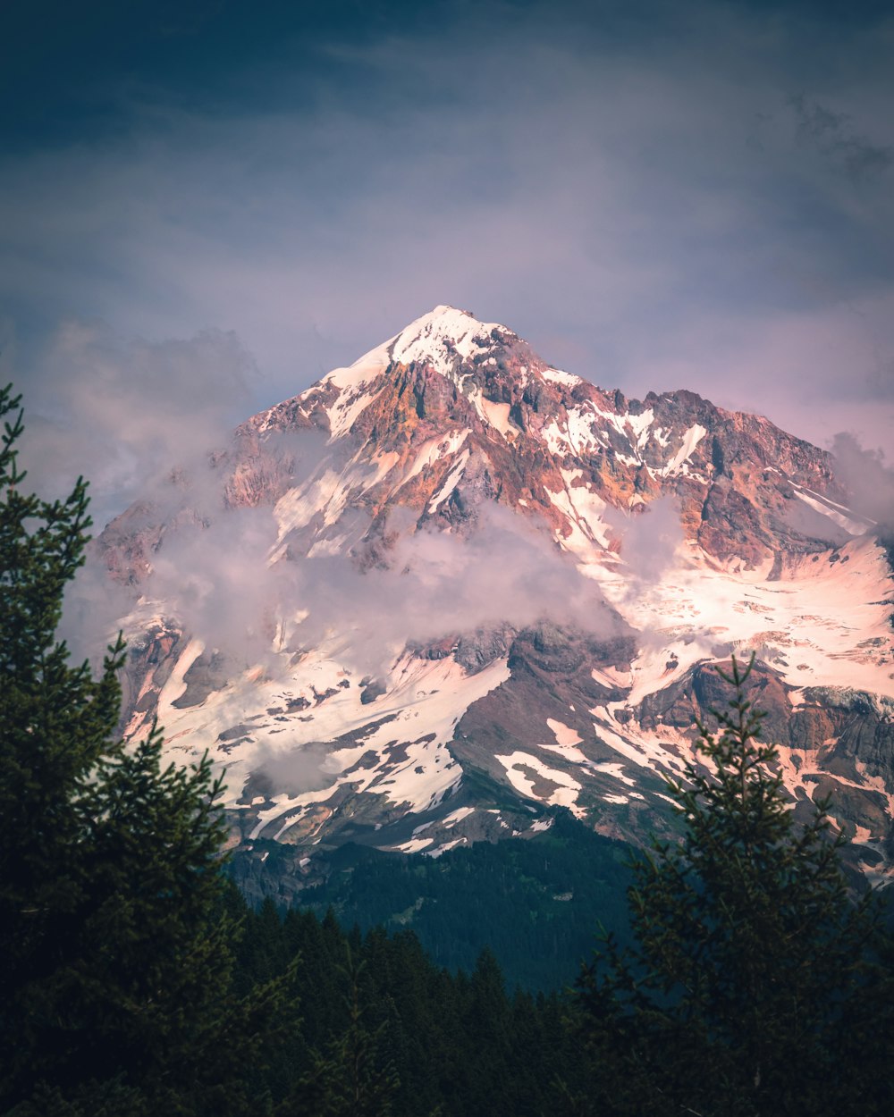 snow covered mountain during daytime