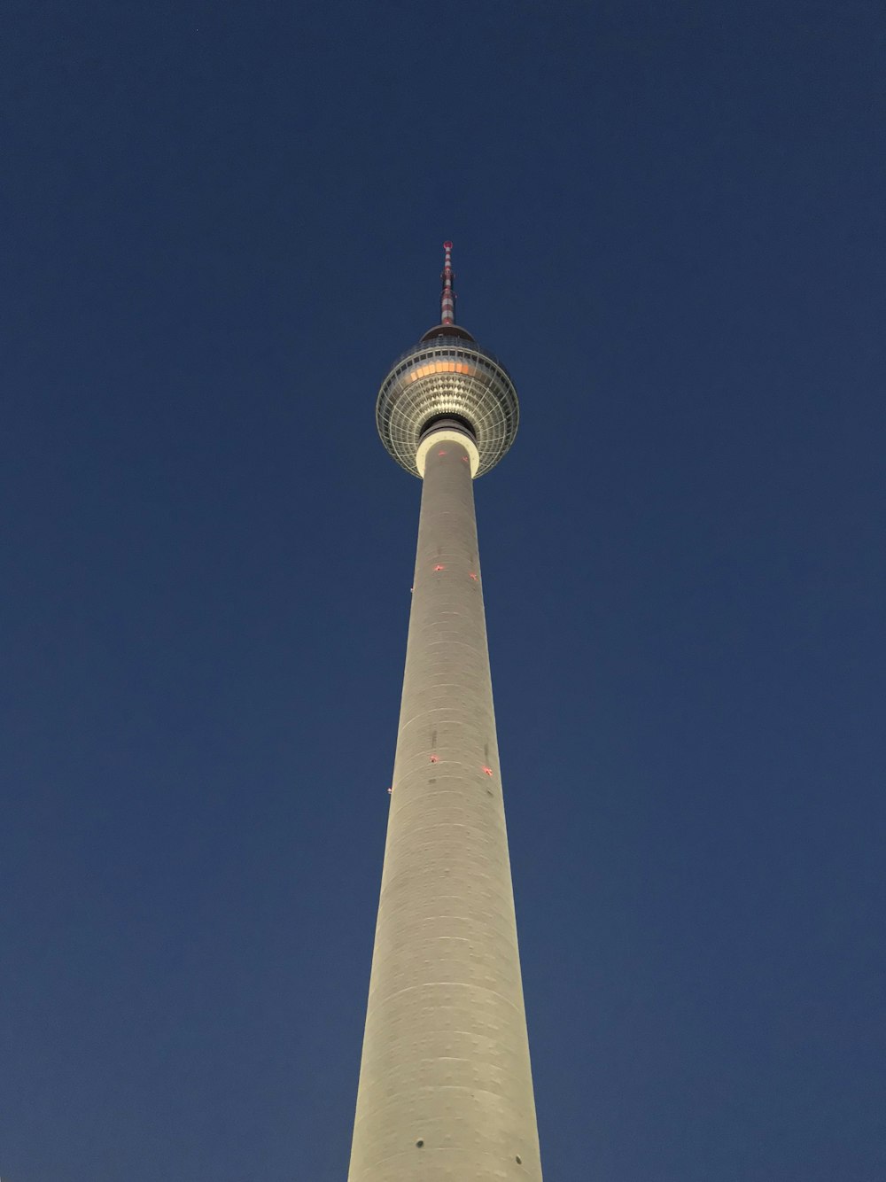 white and brown concrete tower under blue sky during daytime