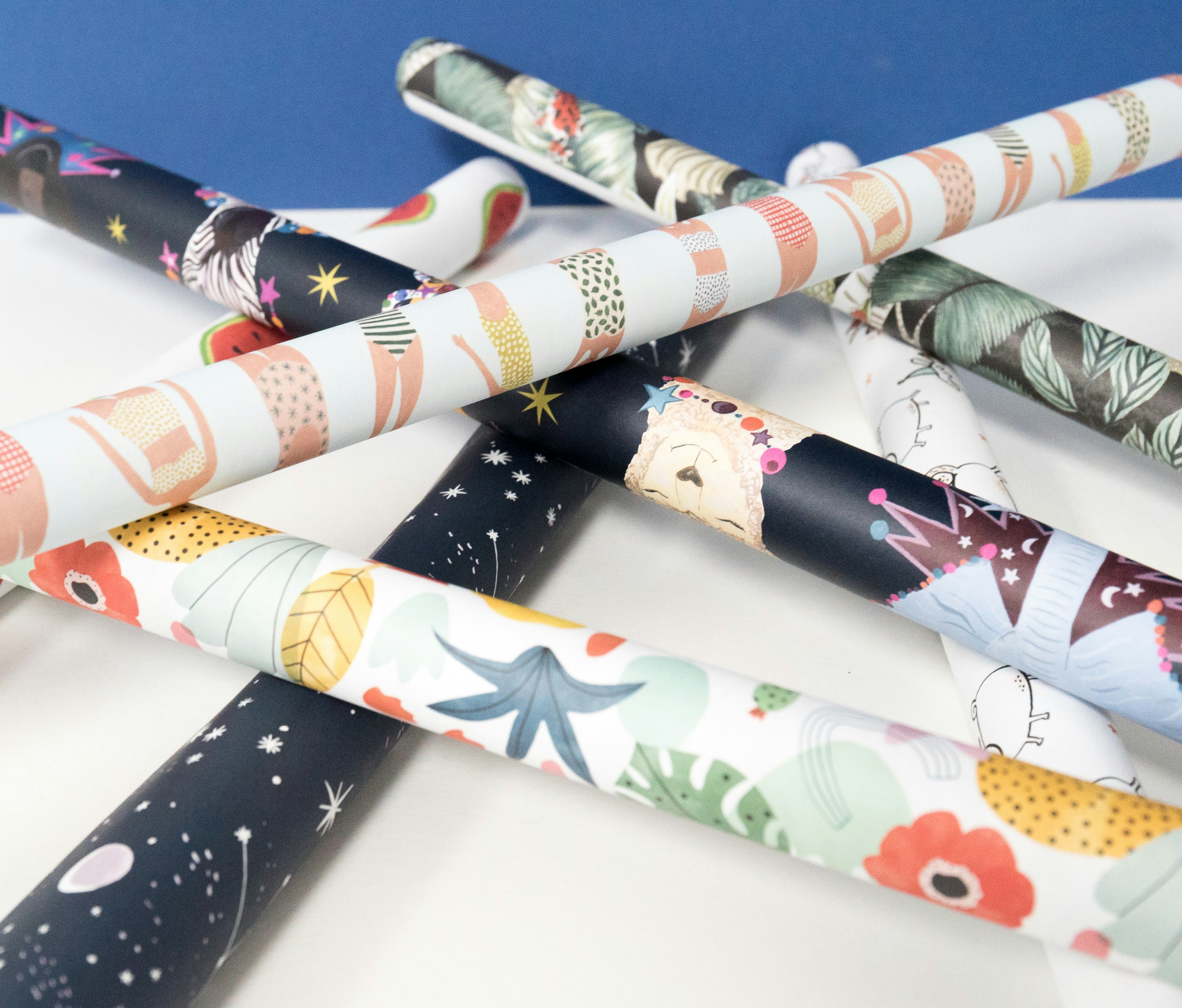 An assorted pile of wrapping paper tubes