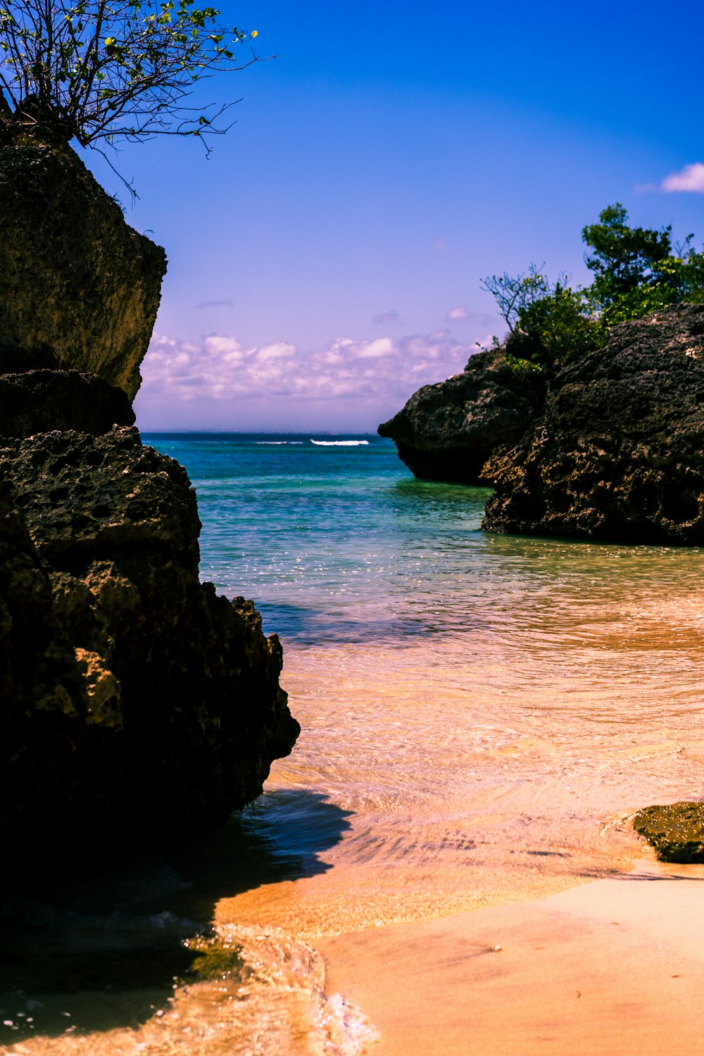 brown rock formation on sea shore during daytime