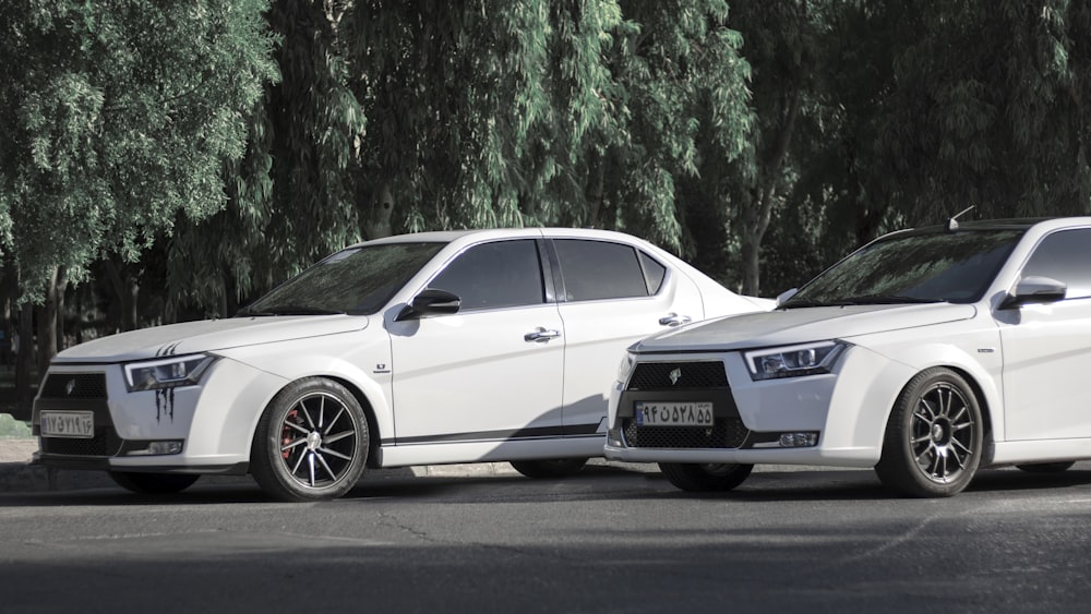 white mercedes benz coupe on road during daytime